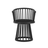 LPD Furniture Lina black velvet dining chair with curved spindle back and black satin wood frame in a modern dining setting