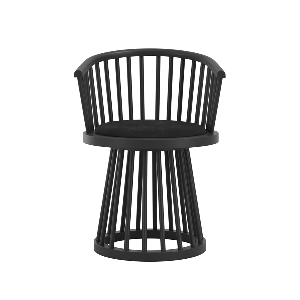 LPD Furniture Lina black velvet dining chair with curved spindle back and black satin wood frame in a modern dining setting