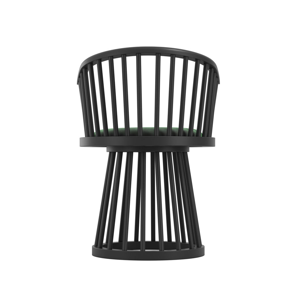 LPD Furniture Lina forest green velvet dining chair with curved spindle back and black satin wood frame in a modern dining setting