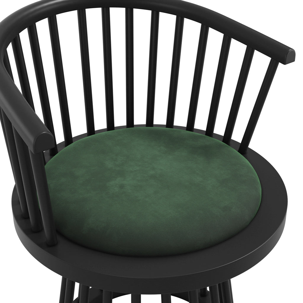 LPD Furniture Lina forest green velvet dining chair with curved spindle back and black satin wood frame in a modern dining setting