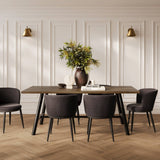 LPD Furniture Louie coffee wood-effect dining table with black frame and silver detailing in a modern dining setting