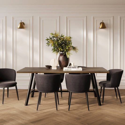 LPD Furniture Louie coffee wood-effect dining table with black frame and silver detailing in a modern dining setting