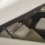 	Maddock beige ottoman storage king bed with split-panel headboard in a modern bedroom setting