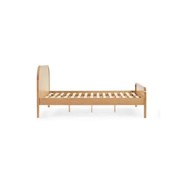 	Milo chevron oak double bed with statement chevron headboard in a modern bedroom setting