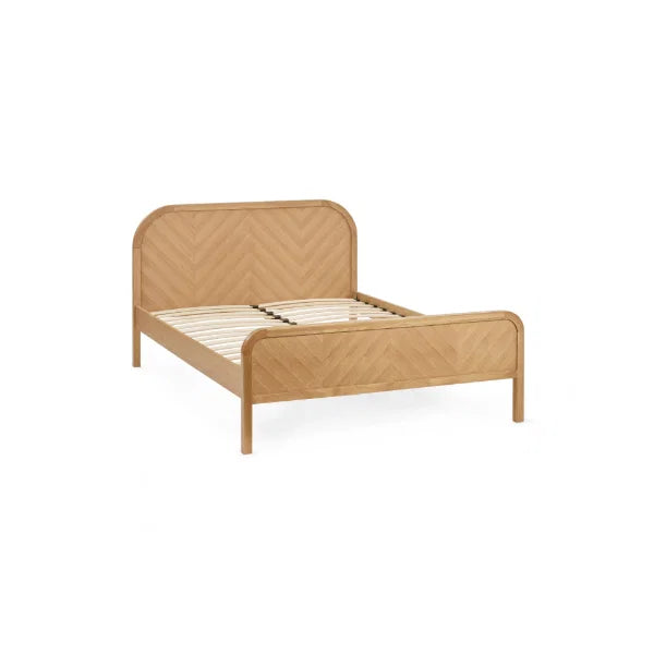 Milo chevron oak king bed with statement chevron headboard in a modern bedroom setting
