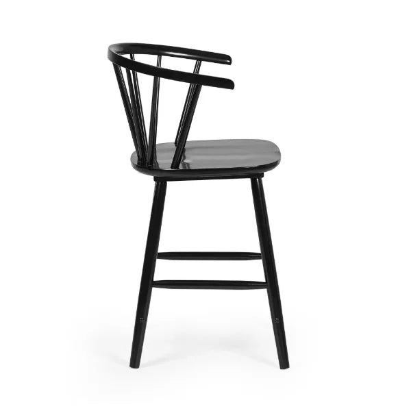 Modena black solid wood bar stool with curved spindle back in a modern kitchen setting