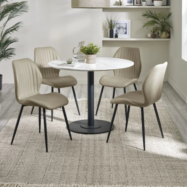 Morris set of 4 taupe faux leather dining chairs in a modern dining room setting