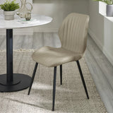 Morris set of 4 taupe faux leather dining chairs in a modern dining room setting