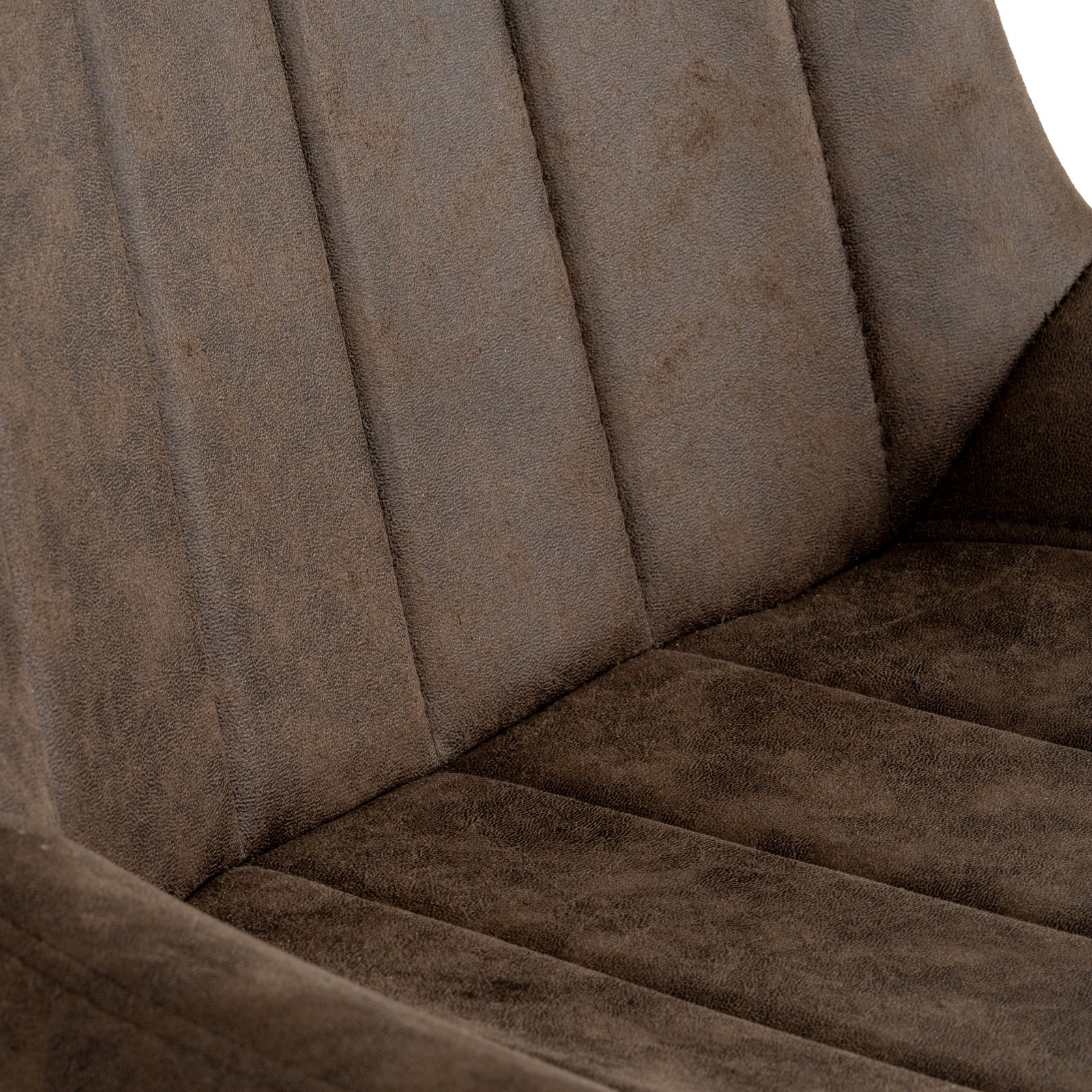 Malmo coffee dining chair in a dining room setting with wooden table and natural lighting