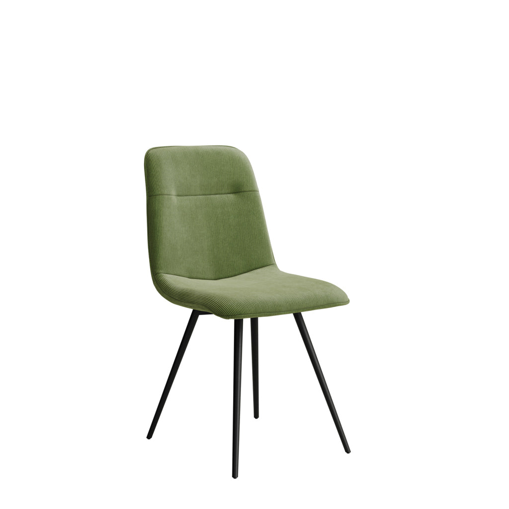 LPD Furniture Maxi moss green corduroy dining chair with black metal legs in a modern dining setting