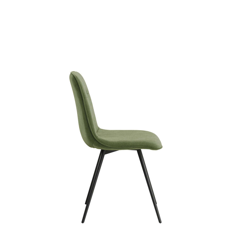LPD Furniture Maxi moss green corduroy dining chair with black metal legs in a modern dining setting