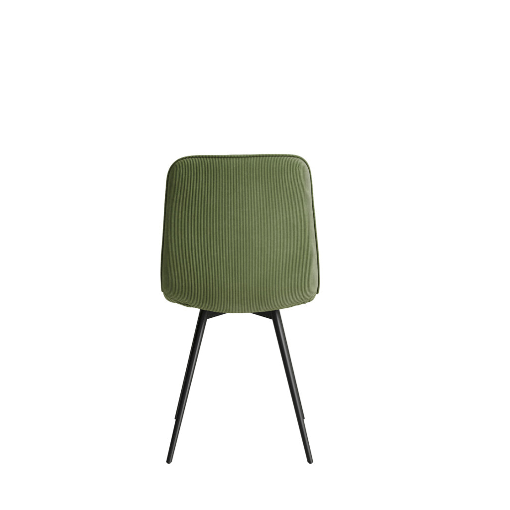 LPD Furniture Maxi moss green corduroy dining chair with black metal legs in a modern dining setting