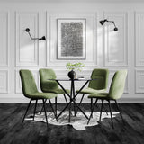 LPD Furniture Maxi moss green corduroy dining chair with black metal legs in a modern dining setting