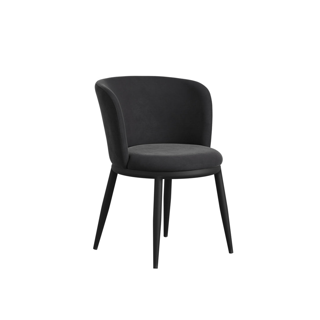 LPD Furniture Nova black velvet dining chair with angular metal legs in a modern dining setting