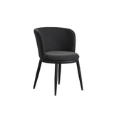 LPD Furniture Nova black velvet dining chair with angular metal legs in a modern dining setting