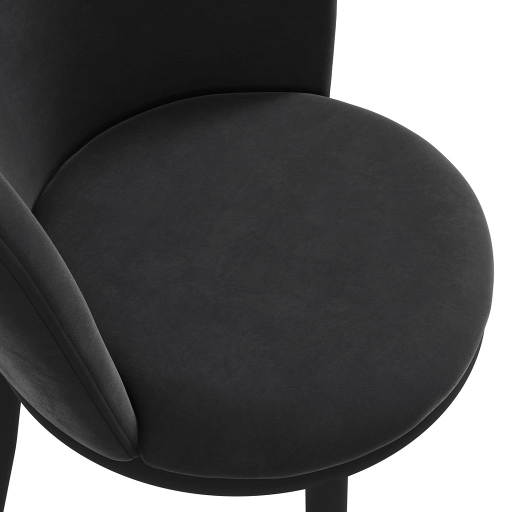 LPD Furniture Nova black velvet dining chair with angular metal legs in a modern dining setting