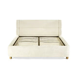 Oberon cream bouclé upholstered bed with curved padded headboard in a modern bedroom setting