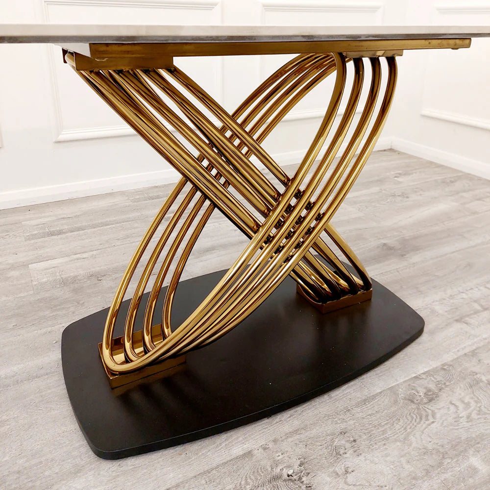 Furnish365 Orion gold and black dining table with polar white sintered stone top in a contemporary dining room setting