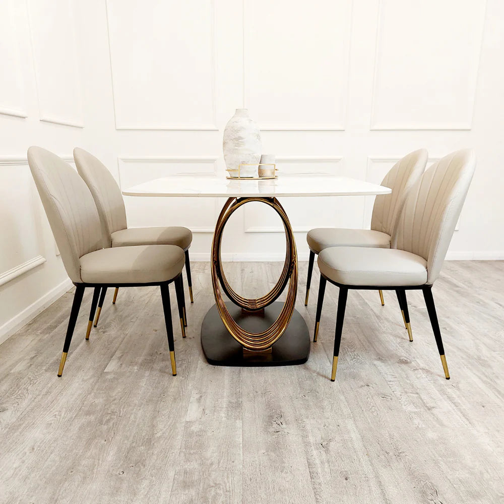 Furnish365 Orion gold and black dining table with polar white sintered stone top in a contemporary dining room setting
