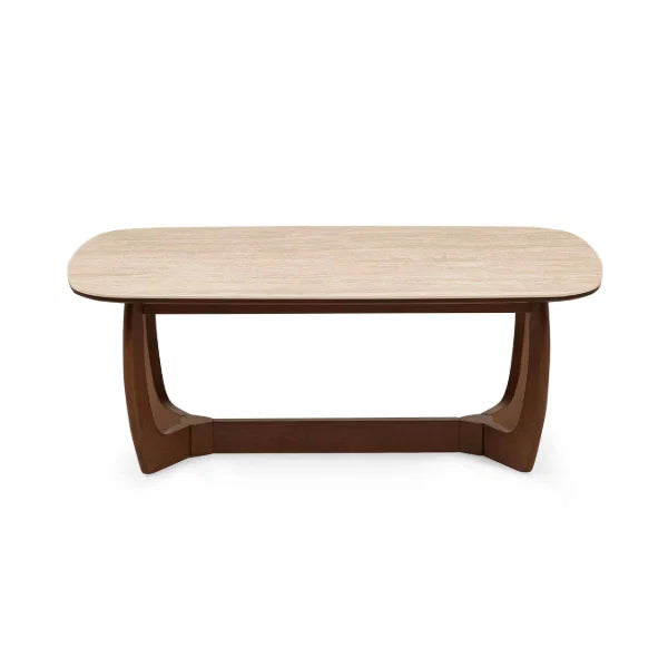 Portland marble top coffee table with sculptural walnut base in a modern living room setting