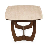 Portland marble top coffee table with sculptural walnut base in a modern living room setting