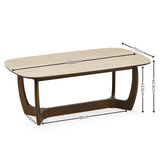 Portland marble top coffee table with sculptural walnut base in a modern living room setting