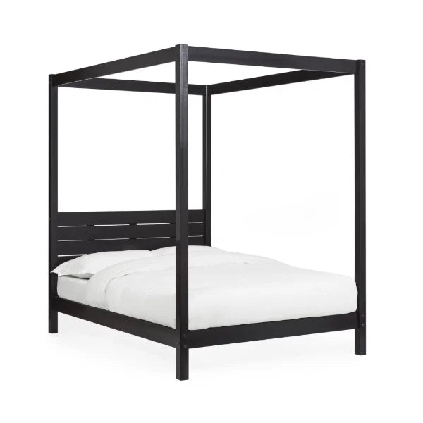 Roxanne black canopy bed with tall open four-poster frame in a modern bedroom setting