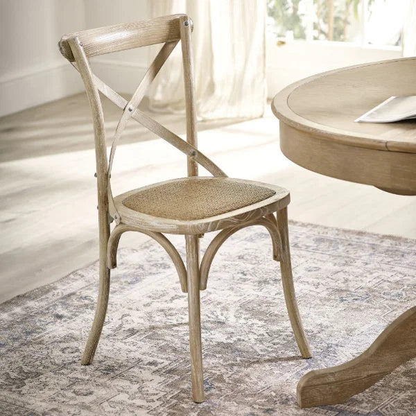 Satie set of 2 bistro dining chairs with cross-back design and woven seat in a modern dining setting