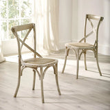 Satie set of 2 bistro dining chairs with cross-back design and woven seat in a modern dining setting