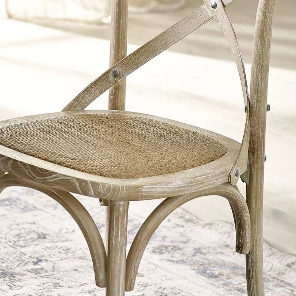 Satie set of 2 bistro dining chairs with cross-back design and woven seat in a modern dining setting
