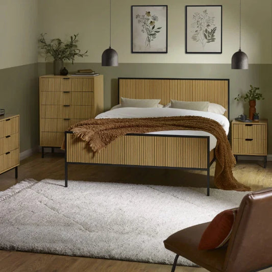 Sia grey upholstered bed frame with textured fabric finish in a modern bedroom setting