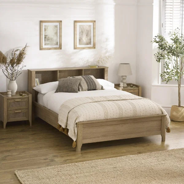 	Sydney rattan effect double bed with integrated shelving headboard in a modern bedroom setting