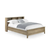 	Sydney rattan effect double bed with integrated shelving headboard in a modern bedroom setting