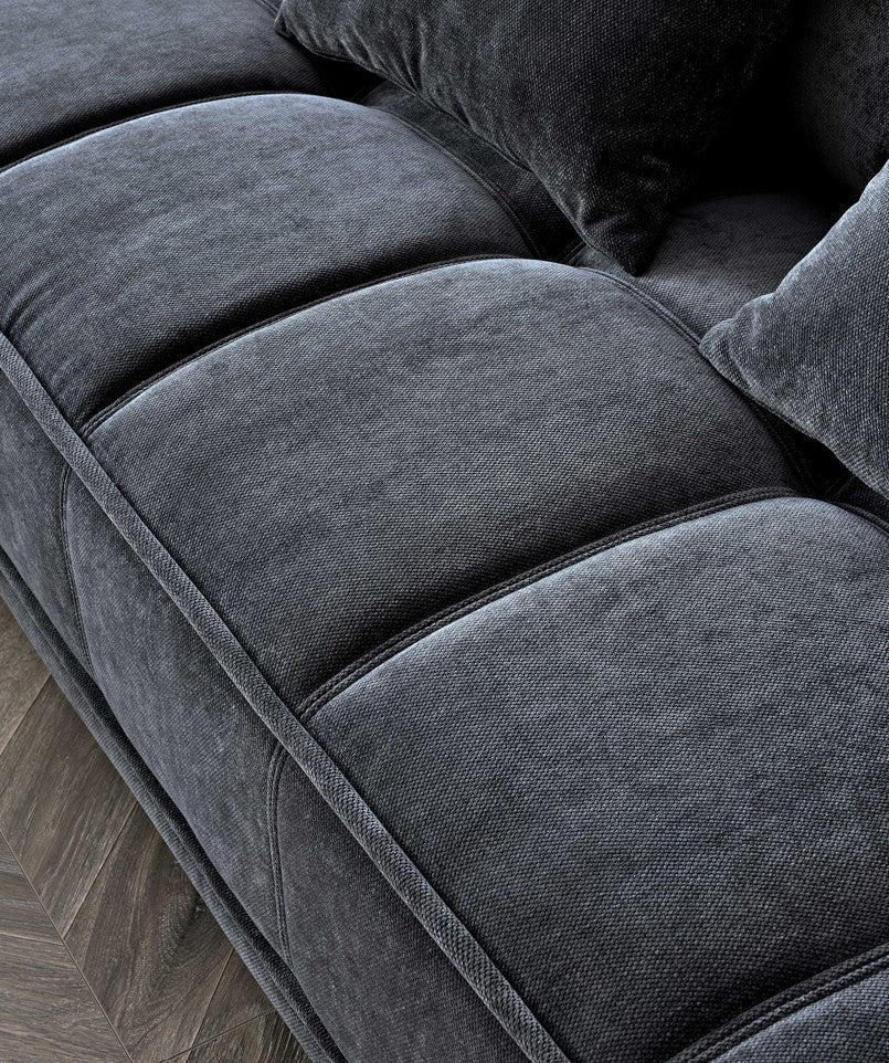 	Furnish365 Gramercy steel mermaid fabric corner sofa in a modern living room setting