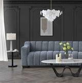 Furnish365 Astoria iron bouclé 3 seater sofa with deep channel stitching in a modern living room setting