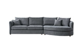 Furnish365 Rubin bouclé corner chaise with organic curved shape in a modern living room setting