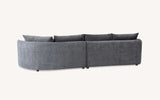 Furnish365 Rubin bouclé corner chaise with organic curved shape in a modern living room setting