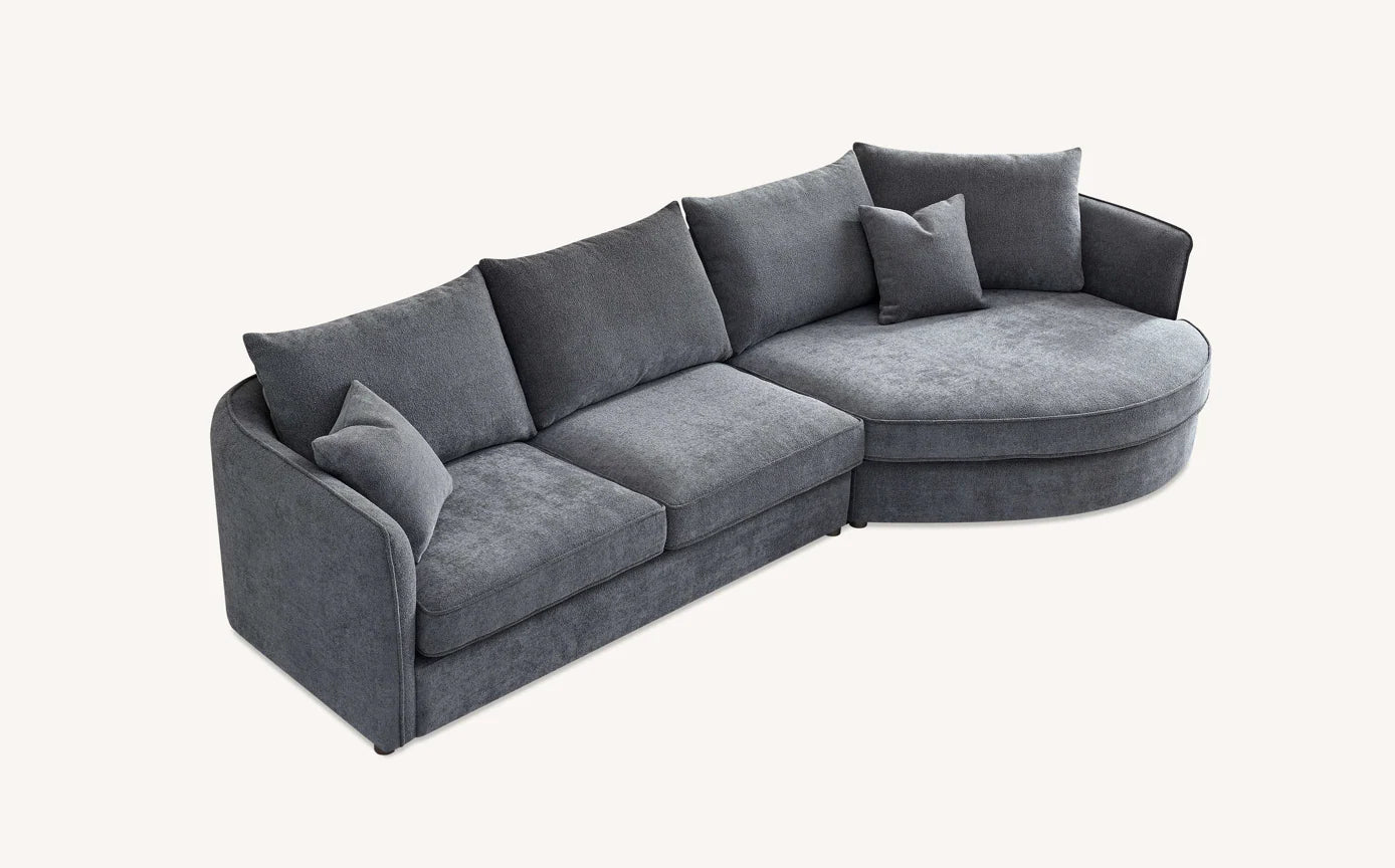 Furnish365 Rubin bouclé corner chaise with organic curved shape in a modern living room setting