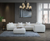 	Furnish365 Lottie modular bouclé corner sofa with scatter cushions in a modern living room setting