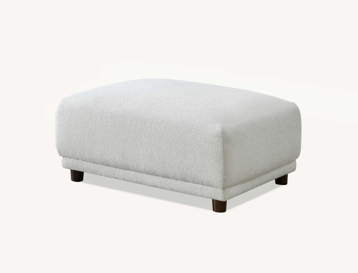 	Furnish365 Lottie modular bouclé corner sofa with scatter cushions in a modern living room setting