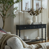 Side view of Hill Interiors Contour Collection black wooden console table with three drawers