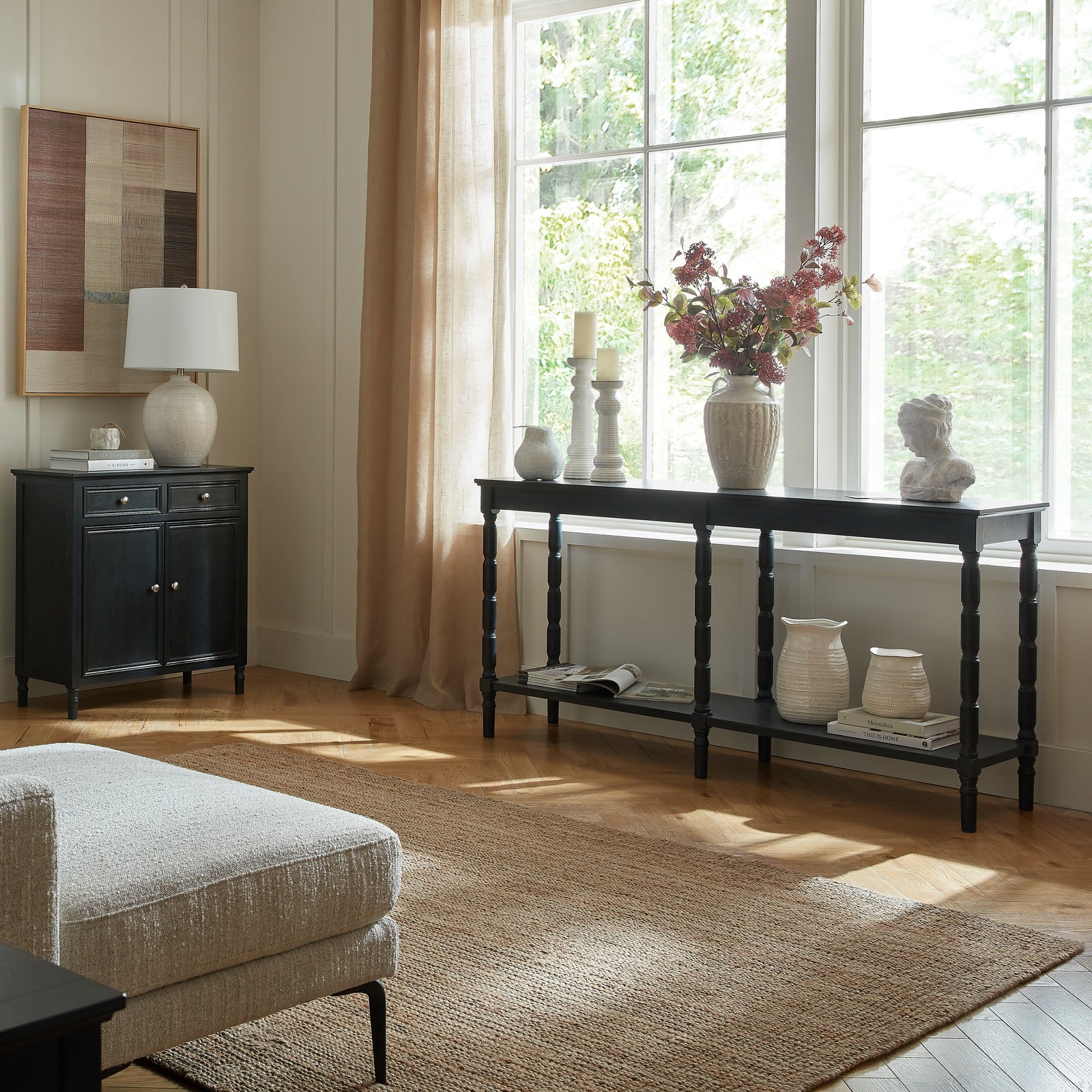 Side view of Hill Interiors Contour Collection large black wooden console table
