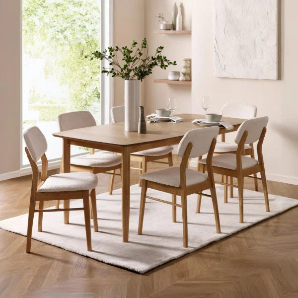 Theia oak extending dining table in a modern dining room setting
