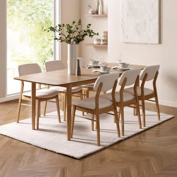 Theia oak extending dining table in a modern dining room setting