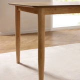 Theia oak extending dining table in a modern dining room setting