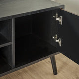 	Julian Bowen Trent large TV unit in walnut and black finish in a modern living room setting