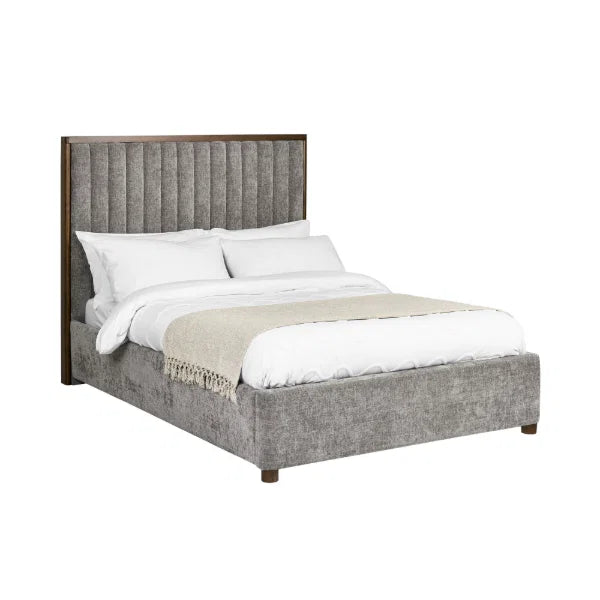 Whitmore upholstered double bed with vertical stitched headboard and walnut frame in a modern bedroom setting