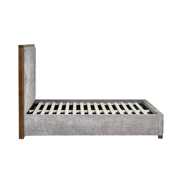 Whitmore upholstered double bed with vertical stitched headboard and walnut frame in a modern bedroom setting