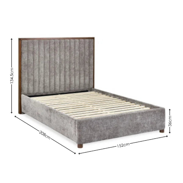 Whitmore upholstered double bed with vertical stitched headboard and walnut frame in a modern bedroom setting