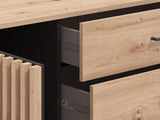 Amos Mann Furniture Asmara oak effect and black 4 drawer sideboard in a modern dining room setting